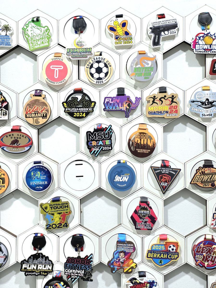 Gambar tegak dinding galeri: medal Edu League Cup, Pushbike 2024, MSU Create 2024, Putrajaya Touch 2024 dan Berkah Cup 2025.